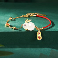 Bracelet chaîne rouge en jade ivoire et fil de bonheur de l'année du lapin de KarmaRipple
