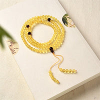 Bracelet d'anxiété en ambre transparent authentique de 108 perles Mala de KarmaRipple