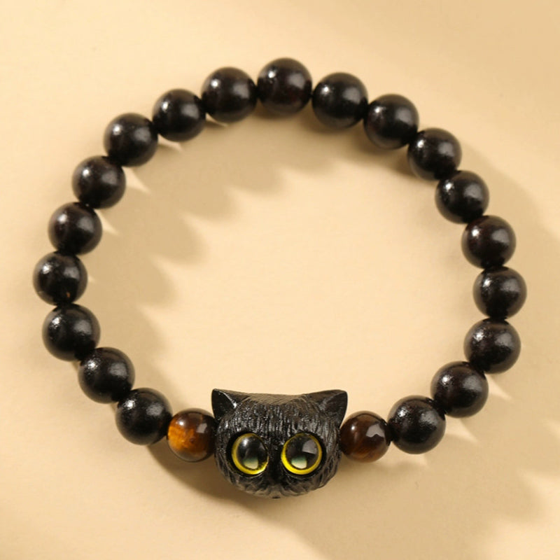 KarmaRipple's Cute Ebony Wood Cat Head Pattern Peace Bracelet p1