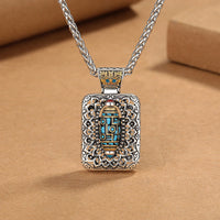 Collier pendentif rotatif et équilibré en bronze avec perles Dzi à neuf yeux de KarmaRipple
