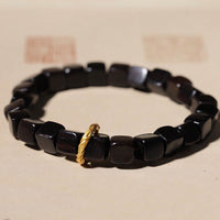 Bracelet tibétain en bois d'ébène carré perlé Peace Calm de KarmaRipple
