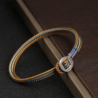 Bracelet en argent sterling 925 fait main avec protection de bouton tissé de KarmaRipple