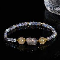 Bracelet d'équilibrage PiXiu en quartz fraise et tourmaline de KarmaRipple