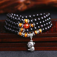 Bracelet Mala de fortune en obsidienne noire et œil de tigre, 108 perles du zodiaque chinois de KarmaRipple