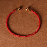 Bracelet manchette tressé fait main au design simple de KarmaRipple