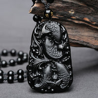Collier pendentif en perles de force gravées en obsidienne noire de KarmaRipple