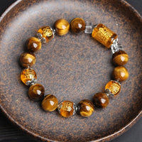 Bracelet de prospérité en perles d'œil de tigre de KarmaRipple