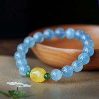 Bracelet d'équilibrage Sérénité en perles d'ambre aigue-marine authentiques de KarmaRipple