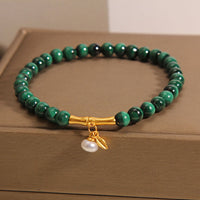 Bracelet anti-anxiété en bambou et perles de malachite authentiques de KarmaRipple