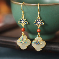 Boucles d'oreilles en bronze avec trèfle à quatre feuilles et jade de KarmaRipple