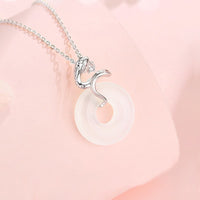 Collier avec pendentif en argent sterling 925 et calcédoine de KarmaRipple, symbole de la paix et de l'équilibre, année du serpent