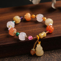 Bracelet talisman de richesse en perles de citrouille Pixiu en soie dorée et cristaux de jade authentiques de KarmaRipple
