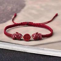 Bracelet en fil rouge avec boucle de paix et pièce de bronze en cinabre PiXiu de KarmaRipple