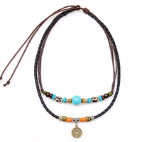 Pendentif de protection en perle Dzi turquoise de KarmaRipple