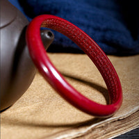 Bracelet jonc gravé du Sutra du cœur en cinabre de KarmaRipple