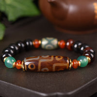 Bracelet de protection tibétain authentique à neuf yeux et à trois yeux de KarmaRipple