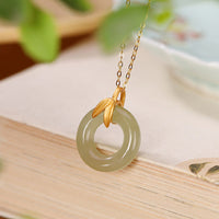 Collier avec pendentif en argent sterling 925 et jade cyan, boucle de paix, feuille de bambou, équilibre, de KarmaRipple