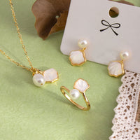 Ensemble de boucles d'oreilles, collier et bague en bronze avec pendentif en pierre de ginkgo tridacna de KarmaRipple