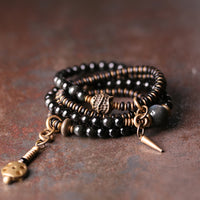 Bracelet multicouche positif en bronze, bois d'ébène et obsidienne arc-en-ciel de KarmaRipple