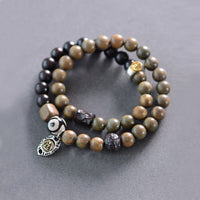 Bracelet double tour en bois de santal vert tibétain de KarmaRipple, perle Dzi à trois yeux, symbole Fu, équilibre et paix