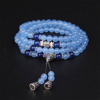 Bracelet Mala d'équilibrage en 108 perles de pierres précieuses bleues de KarmaRipple
