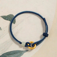 Bracelet porte-bonheur en argent sterling 999 avec boucle de paix et corde en jade Hetian de KarmaRipple
