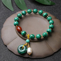 Bracelet talisman de protection en perles d'agate rouge malachite authentiques de KarmaRipple