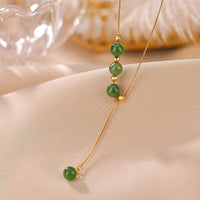 Collier pendentif en argent sterling 925 et jade cyan de KarmaRipple, avec perles et équilibrage