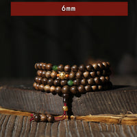 Bracelet Mala 108 perles en or 999 de KarmaRipple, bois d'agar de Kalimantan, jade cyan, six mots vrais, force