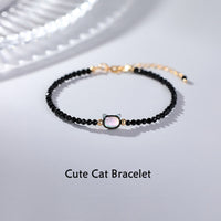 Bracelet d'équilibrage en pierre Tridacna plaqué or 14 carats avec spinelle noire et pierre précieuse ivoire de KarmaRipple
