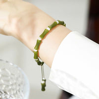 Bracelet authentique en bambou et péridot de KarmaRipple pour l'amour et la paix