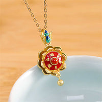 Collier avec pendentif en argent sterling 925 et roue de prière en agate rouge du Tibet, symbole de l'illumination, de KarmaRipple