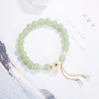 Bracelet de bénédiction de fortune en perles de fleur de pêcher en jade de KarmaRipple