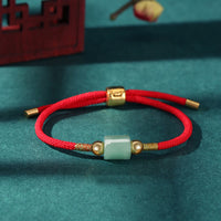 Bracelet en corde tissée fait main au Tibet par KarmaRipple, en aventurine verte, pierre rouge, malachite, protection de la fortune