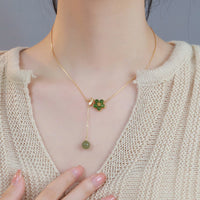 Collier avec pendentif porte-bonheur en argent sterling 925 et jade cyan Hetian de KarmaRipple