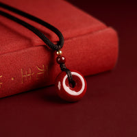 Collier pendentif en cinabre avec boucle de paix et bénédiction calme de KarmaRipple