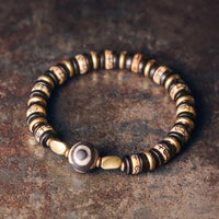 Bracelet de force en bois d'ébène et os de yak tibétain de KarmaRipple