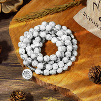 Bracelet Mala d'équilibrage en ivoire et turquoise Lotus de KarmaRipple