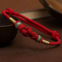 Bracelet tissé en jade rouge à fil rouge « Bring Good Fortune » de KarmaRipple