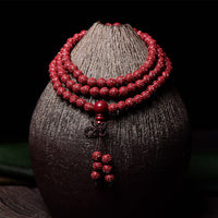 Bracelet de bénédiction gravé à motif Om Mani Padme Hum en perles de cinabre de 108 Mala de KarmaRipple