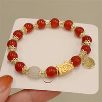 Bracelet de l'année du dragon de KarmaRipple, agate rouge, quartz fraise, obsidienne noire, jade, grenat, perle, cinabre, boulette de dragon, fortune, fu