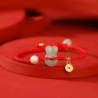 Bracelet en argent sterling 925 avec cordon rouge et pièce de monnaie en jade Hetian de l'année du lapin de KarmaRipple