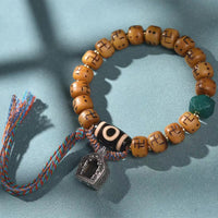 KarmaRipple's Authentique os de chameau tibétain Swastika Dzi Perle Shankha Bouddha Talisman Kirtimukha Fortune Protection Bracelet Pompon