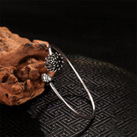 Bracelet jonc rétro Lotus Bronze Ivoire Illumination de KarmaRipple