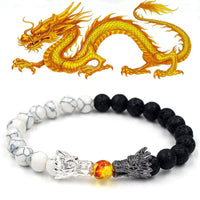 Bracelet de perles en pierre de lave turquoise ivoire de KarmaRipple avec bénédiction du dragon