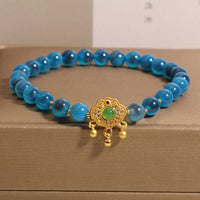 Bracelet d'équilibrage en agate bleue bonbon de KarmaRipple, talisman chinois à cadenas